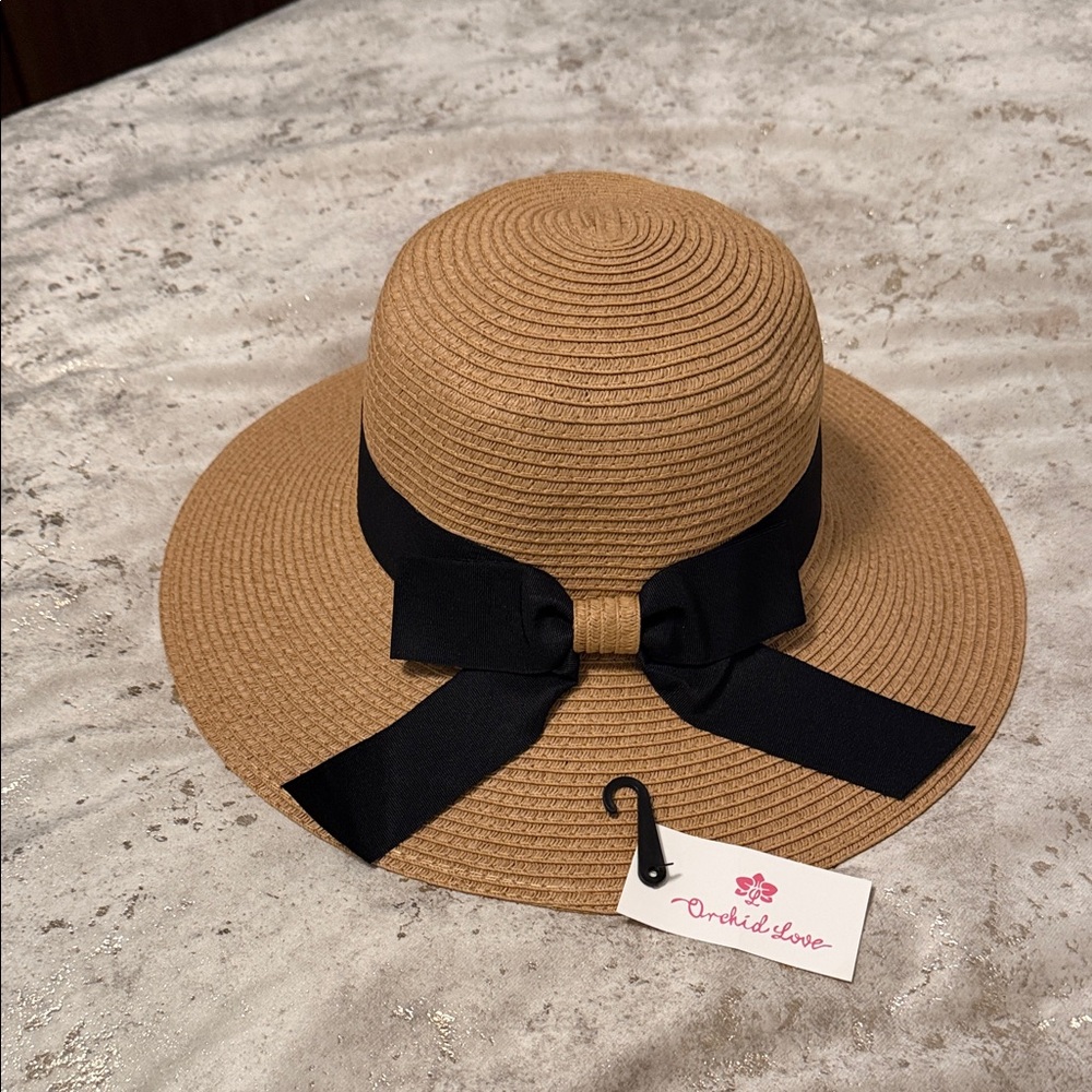Women's Tan Straw Sun Hat with Black Bow